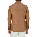 A person from behind wearing a De Petrillo Brown Checked Wool Silk Linen Posillipo Blazer and white pants.