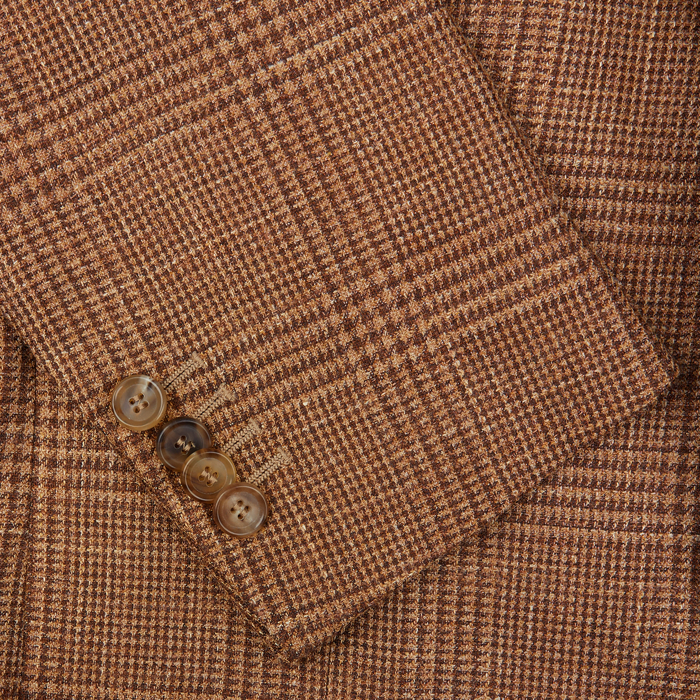 Close-up of a De Petrillo Brown Checked Wool Silk Linen Posillipo Blazer with brown buttons.