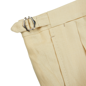 A pair of Caramel Beige Irish Linen Modello B trousers by De Petrillo with a silver buckle.