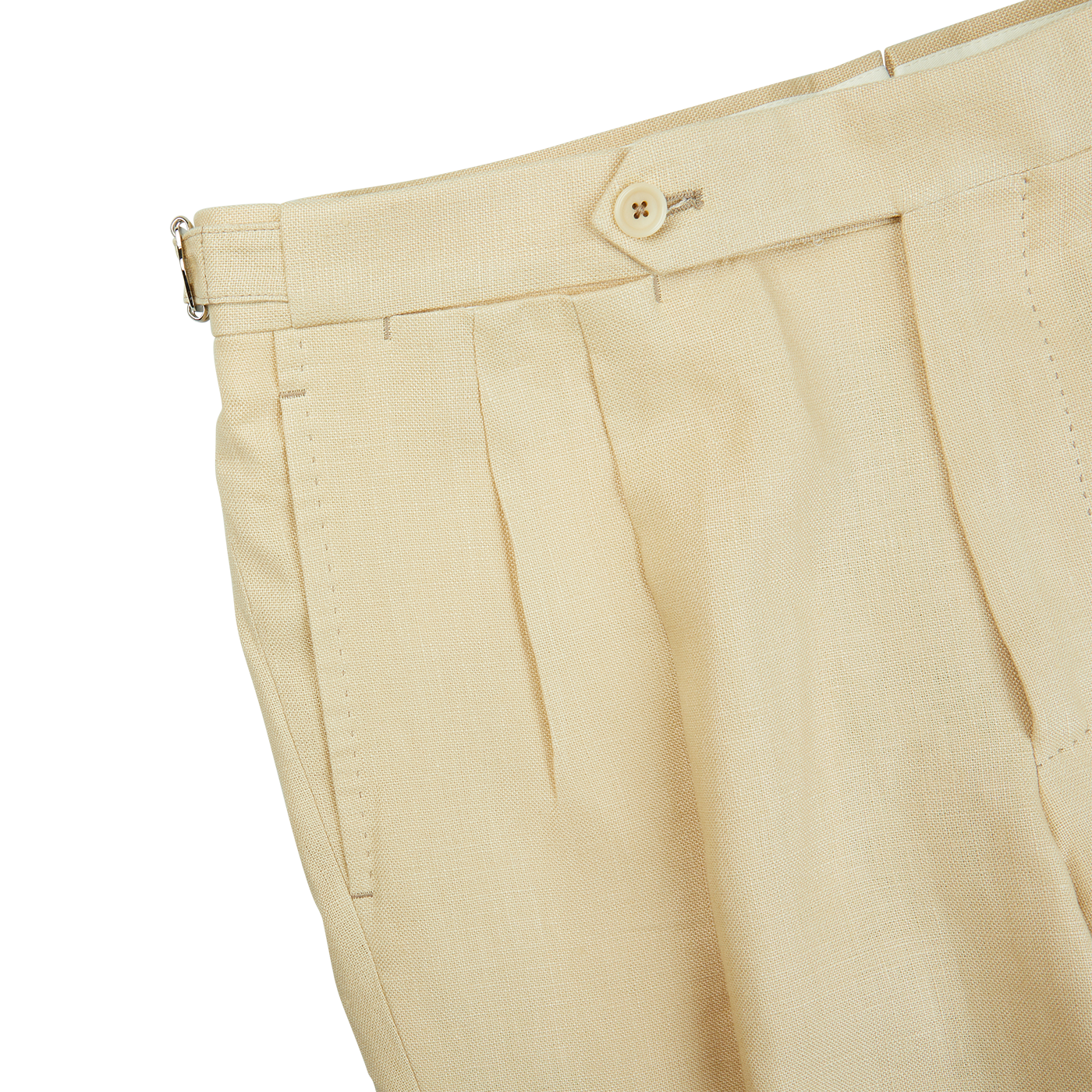 A pair of Caramel Beige Irish Linen Modello B trousers with buttons on the side from De Petrillo.