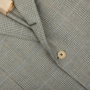 Close-up of a De Petrillo Green Checked Wool Cotton Cashmere Posillipo Blazer with a button and collar detail.