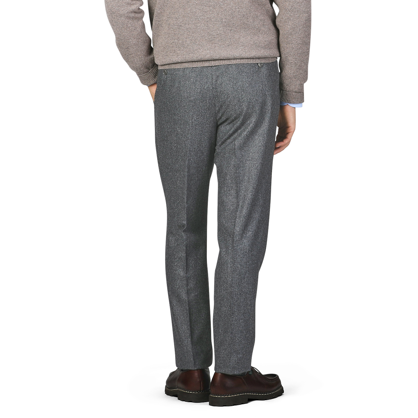 A person wearing De Petrillo's Medium Grey Wool Flannel Modello B Trousers and brown shoes is standing with their back to the camera.