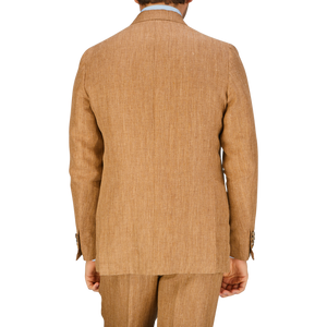 Man in a Tobacco Brown Herringbone Pure Linen Suit jacket with a herringbone pattern, viewed from the back by De Petrillo.