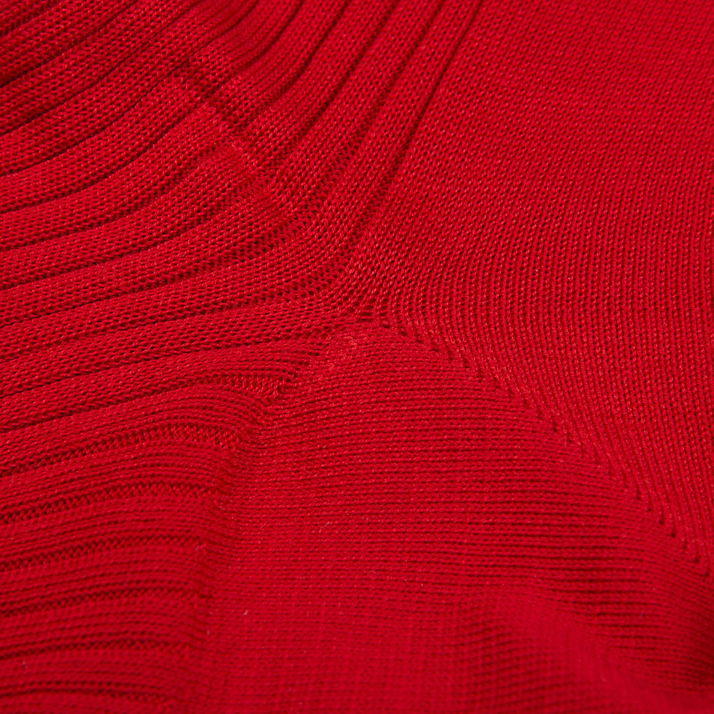 Close-up texture of a Groseille Red Cotton Fil d'Ècosse Ribbed Socks from Doré Doré showing detailed weave patterns, featuring mercerised cotton lisle.
