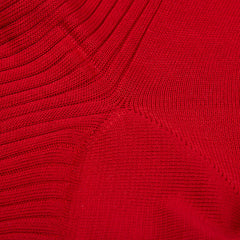 Close-up texture of a Groseille Red Cotton Fil d'Ècosse Ribbed Socks from Doré Doré showing detailed weave patterns, featuring mercerised cotton lisle.