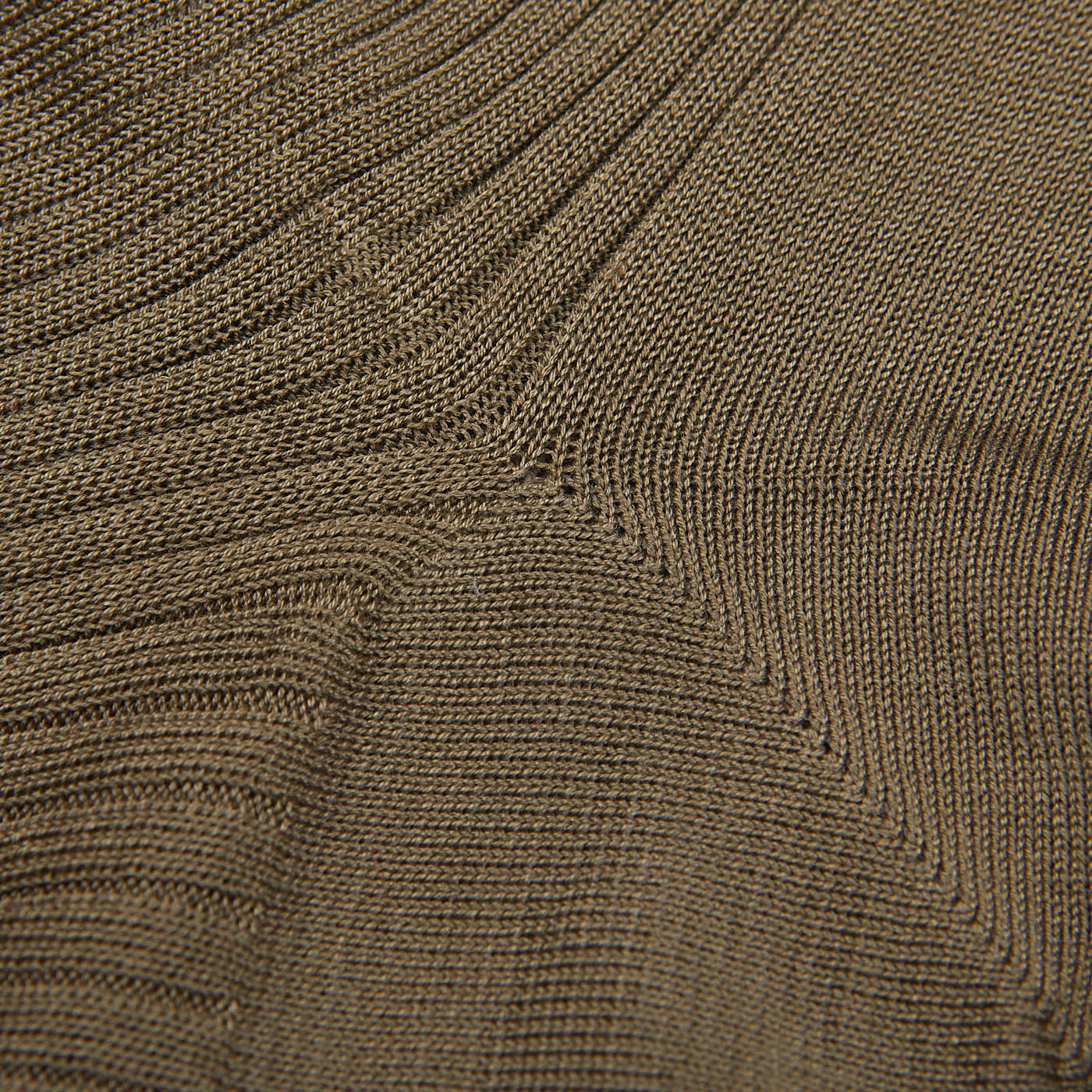 Close-up of a Doré Doré Terre Green Cotton Fil d'Ècosse Ribbed Sock showing detailed weave pattern in a brown color.