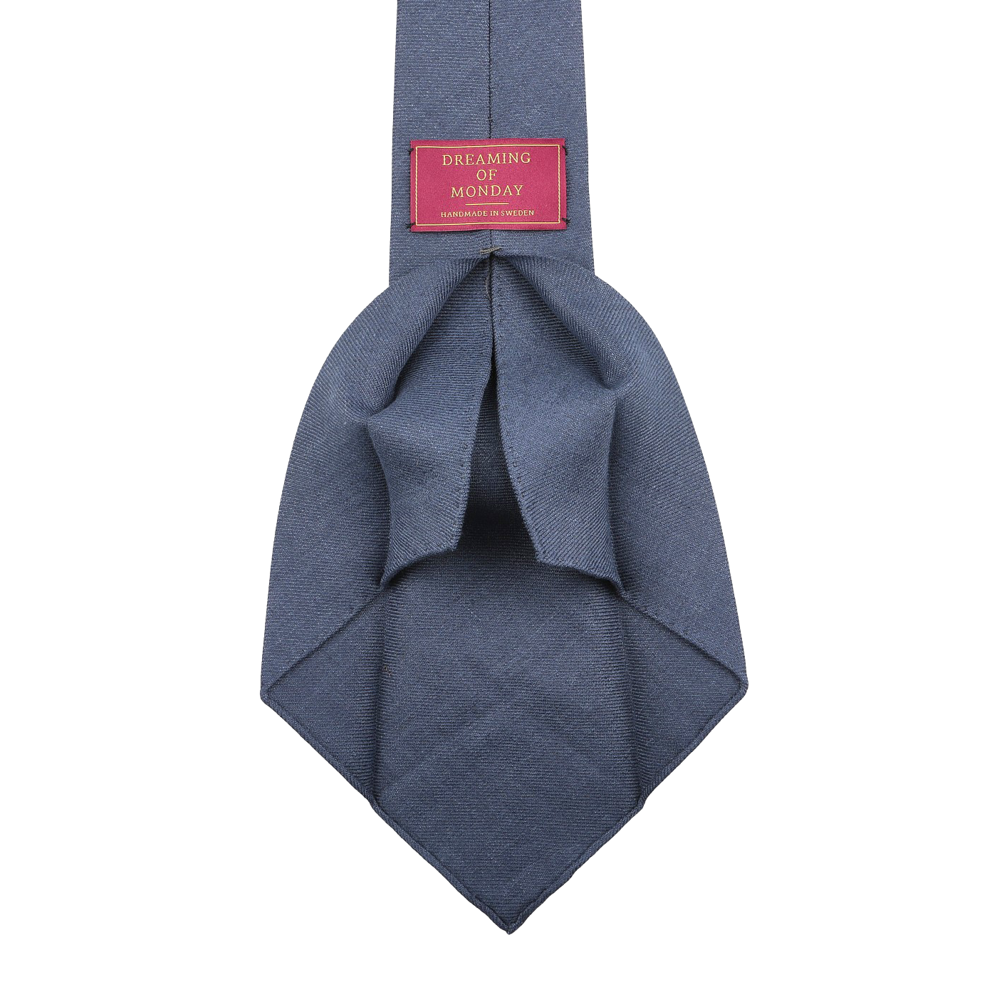 A cobalt blue handmade "Dreaming Of Monday" Bleu Cézanne 7-Fold French Linen Tie is displayed against a plain background, highlighting its unlined 7-fold construction.