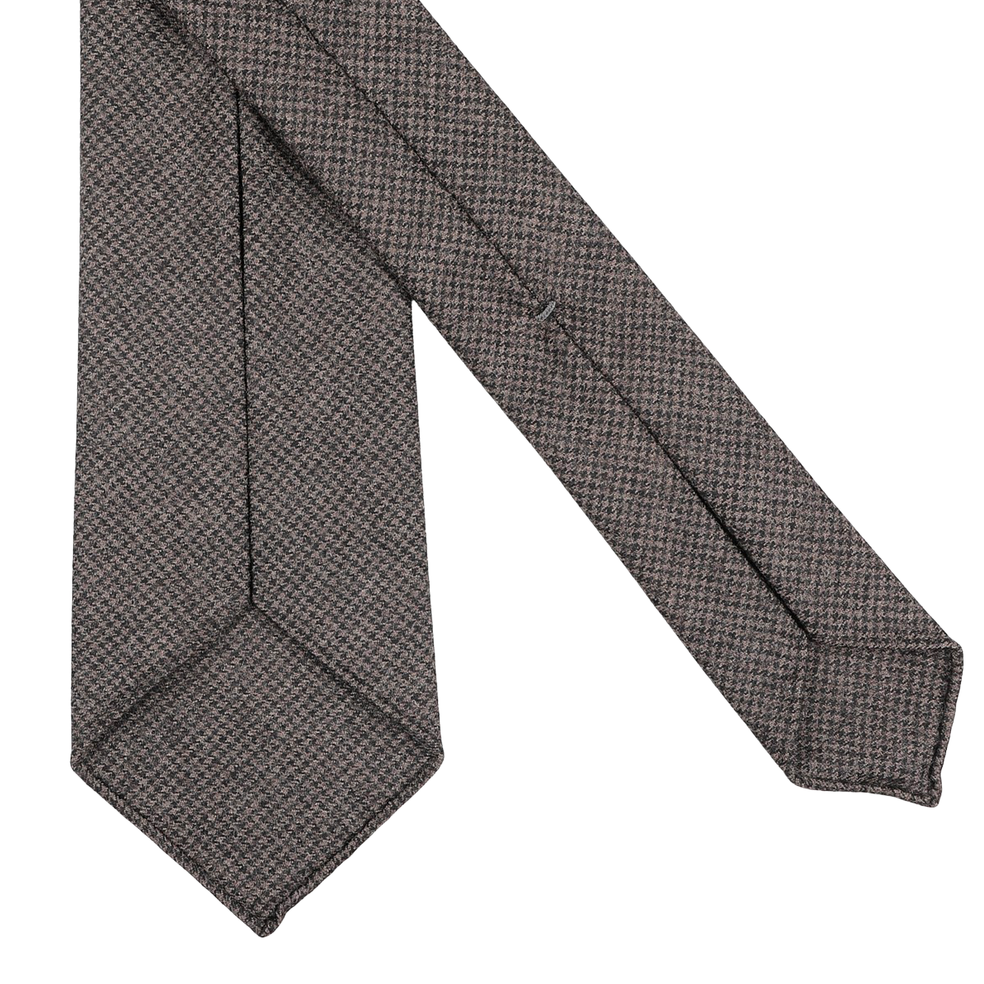 A Dark Brown Dogtooth 7-Fold Wool Flannel Tie by Dreaming Of Monday, showcasing a brown and gray houndstooth pattern, elegantly folded against a white background.