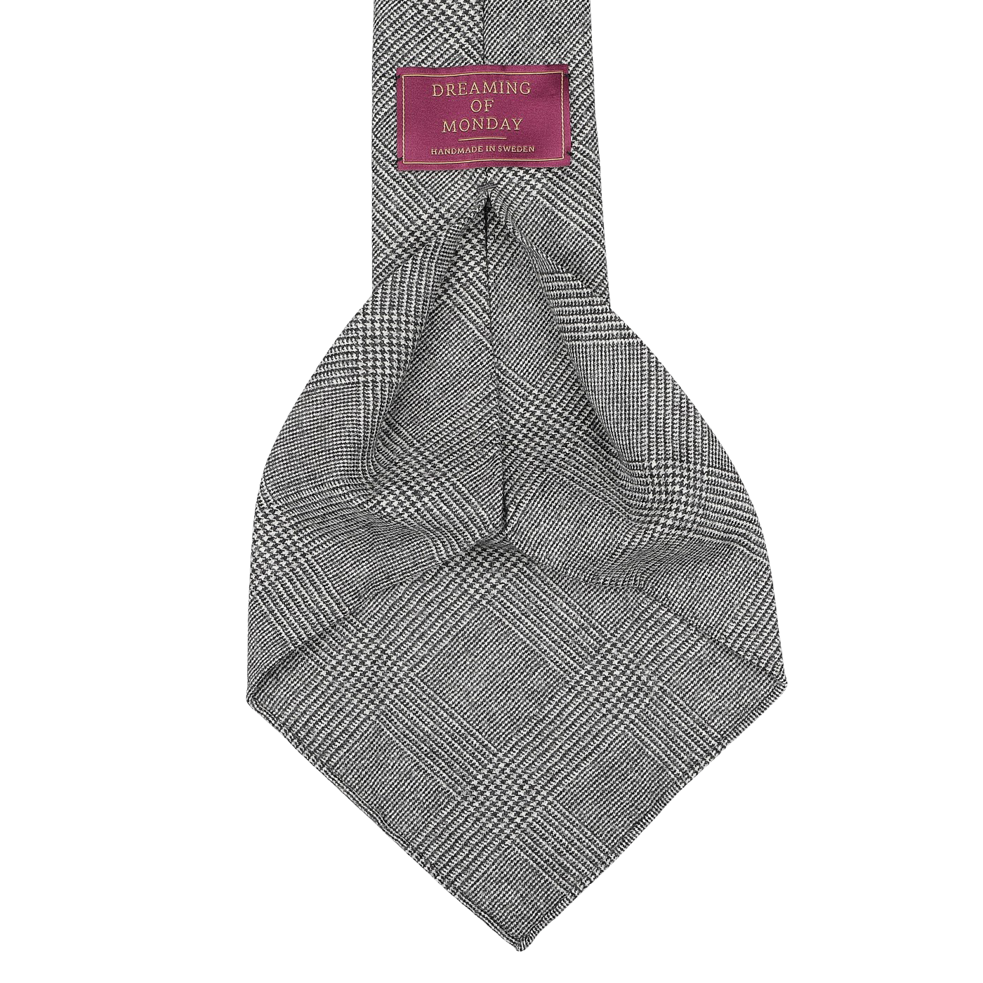 A luxurious super 120s wool flannel necktie in gray Glen check, featuring an unlined 7-fold construction and labeled "Dreaming Of Monday".