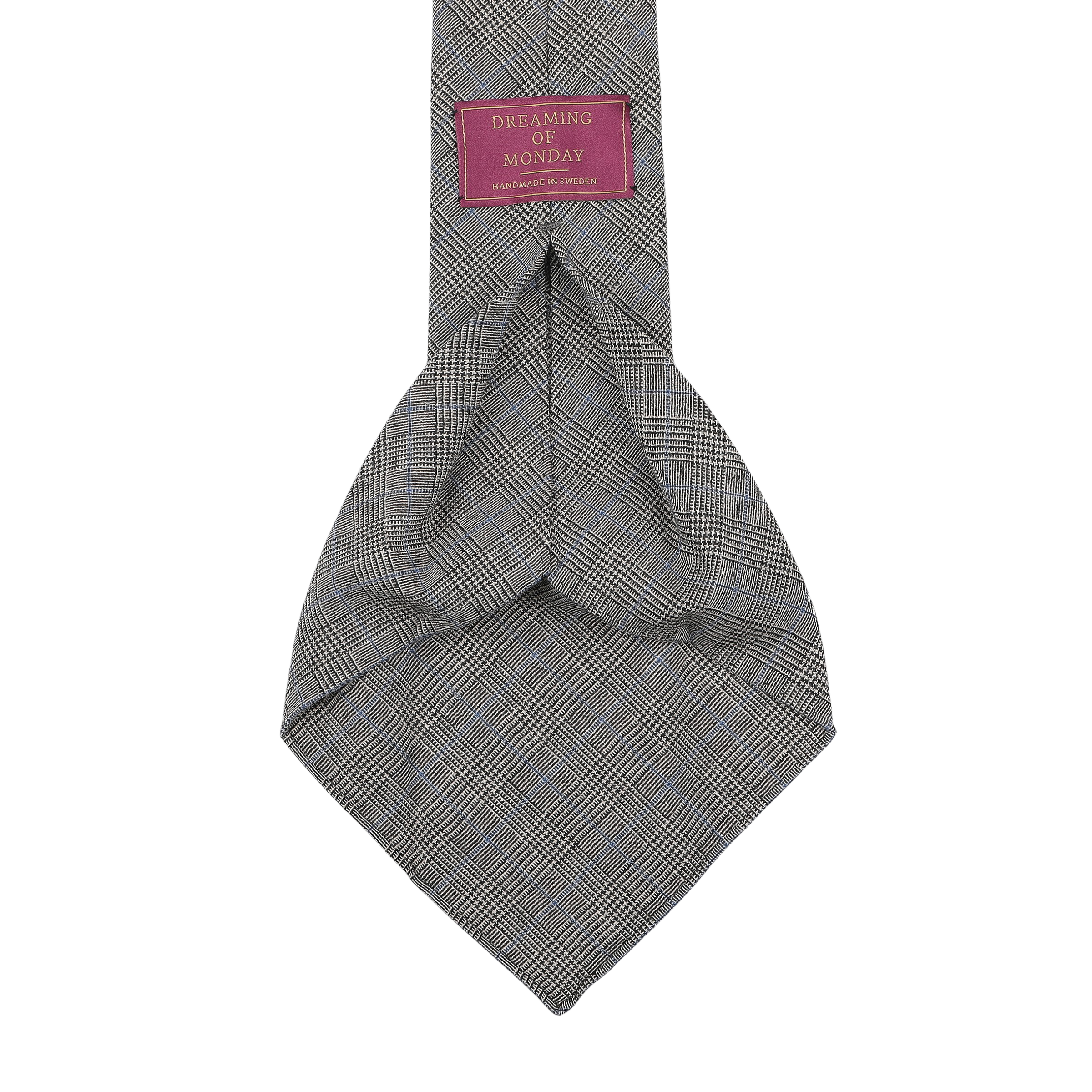 The Grey Micro Glen Plaid 7-Fold Vintage Wool Tie features the "Dreaming Of Monday" label on a black background.