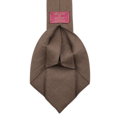 The Marronniers Brown 7-Fold French Linen Tie by Dreaming Of Monday combines exquisite craftsmanship with elegant brown tones.