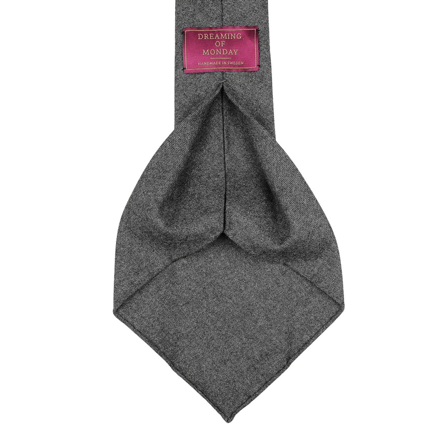 Mid Grey 7-Fold Wool Flannel Tie, crafted by Dreaming Of Monday, with a visible brand label attached to the back side.