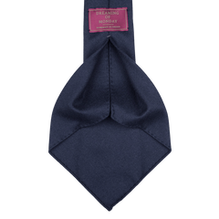 Exquisitely crafted navy blue wool flannel tie from Dreaming Of Monday, featuring 7-fold construction and a red label with "Made in Sweden.