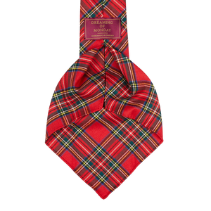 A handmade Red Royal Stewart Tartan 7-Fold Wool Tie crafted with worsted wool in the iconic Royal Stewart tartan pattern, set against a clean white background by Dreaming Of Monday.
