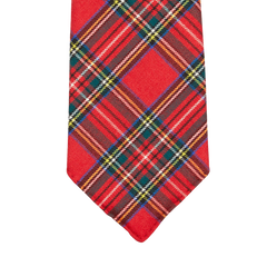 A Red Royal Stewart Tartan 7-Fold Wool Tie by Dreaming Of Monday on a white background.