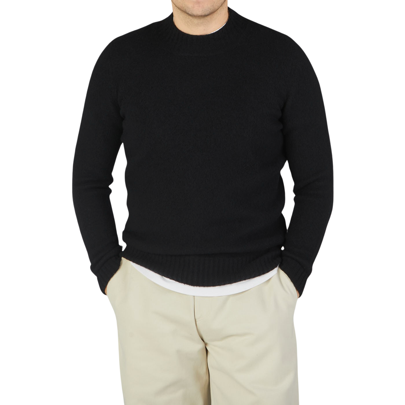 A man wearing a Drumohr Black Brushed Lambswool High Neck Sweater.