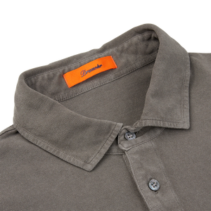 This brown grey Drumohr cotton piquet LS polo shirt features an orange label on the collar.
