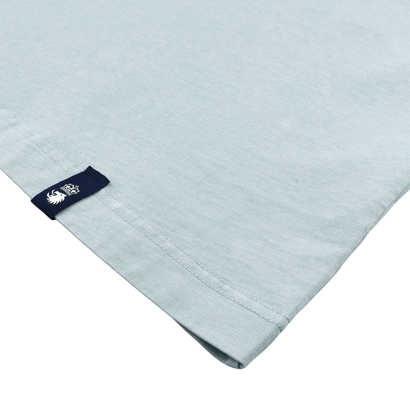 This Sky Blue Washed Cotton T-Shirt by Drumohr, crafted in Italy, offers a slim fit and includes a small black tag with a white logo at the lower edge.