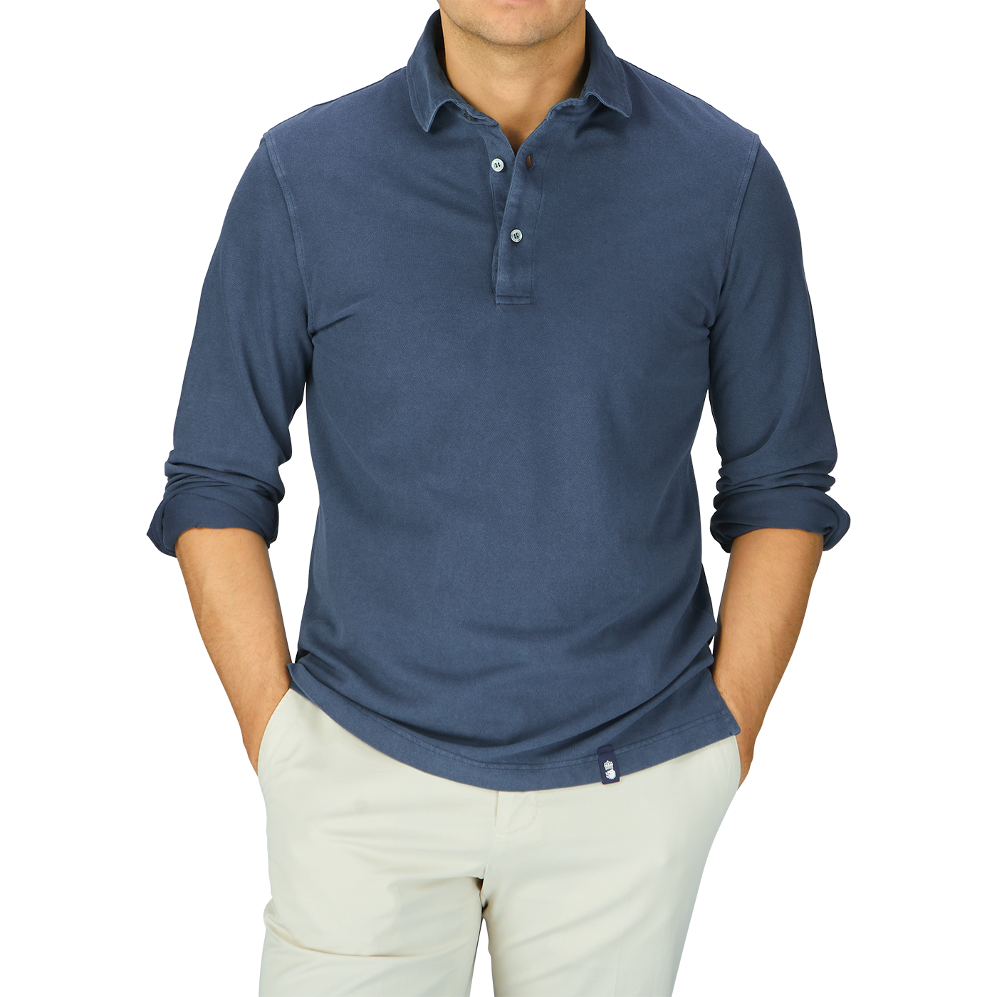 A man wearing a Drumohr Medium Blue Cotton Piquet LS Polo Shirt and khaki pants.