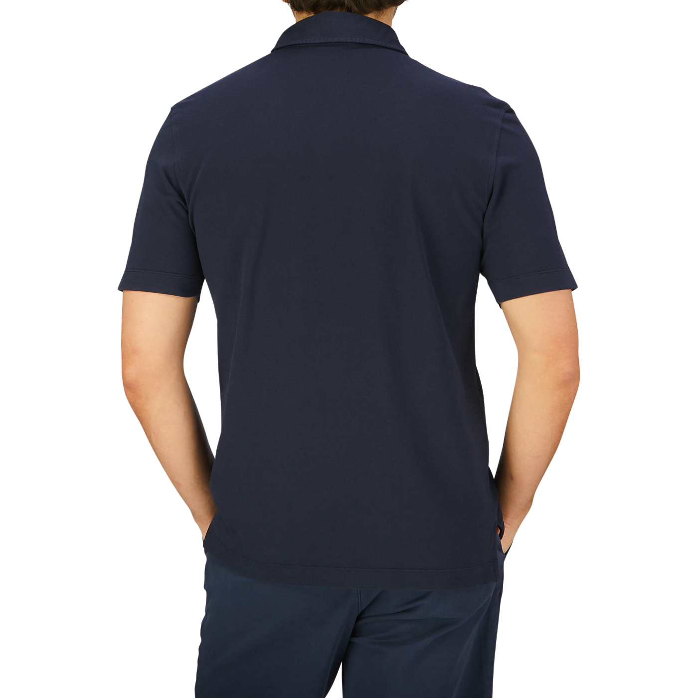 A man seen from behind wearing a dark blue Drumohr Navy Blue Cotton Piquet Polo Shirt and matching pants.