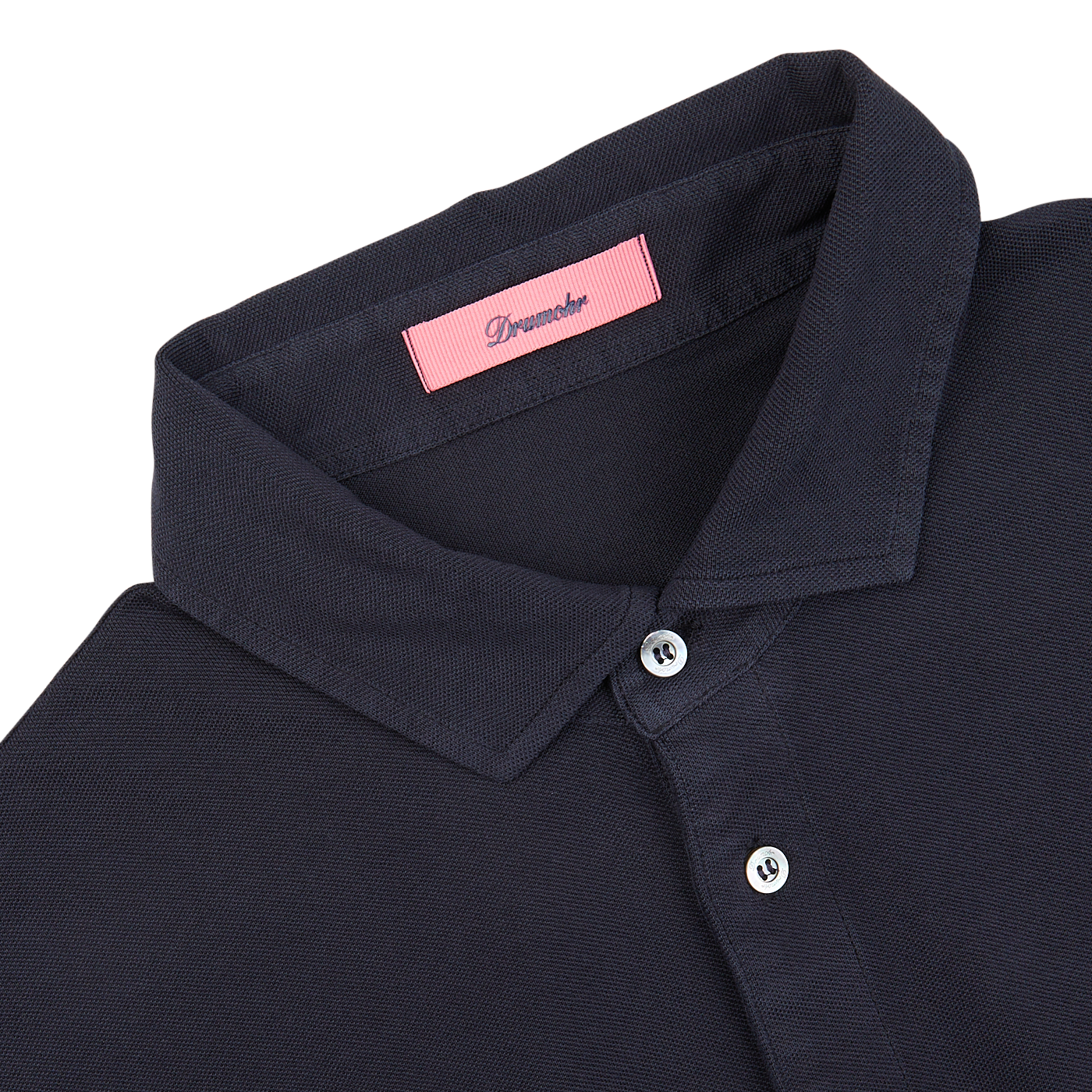 Close-up of a Navy Blue Cotton Piquet Polo Shirt with a pink Drumohr label on the collar, made in Italy.