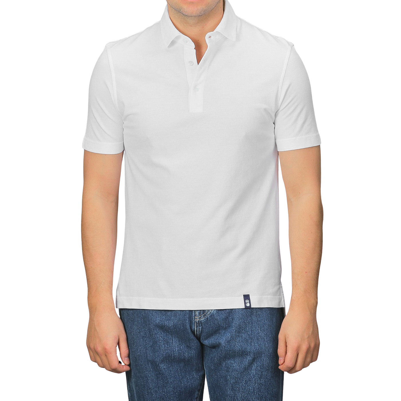 A person in a Drumohr Off-White Cotton Pique Polo Shirt and blue jeans stands against a plain background. The shirt's slim fit with a buttoned collar and small tag above the hem adds subtle detail.