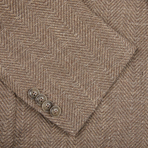 A close up of a Eduard Dressler Brown Herringbone Cotton Blend Sendrik Blazer.