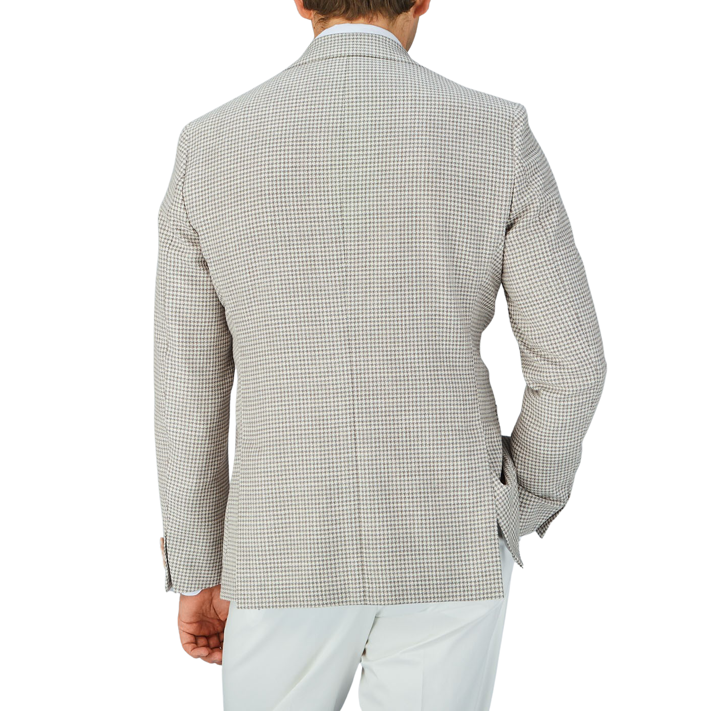 The back view of a man wearing a Grey Beige Houndstooth Wool Blend Sendrik Blazer and white pants, with an Eduard Dressler touch to it.