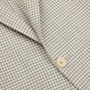 A close up of a Grey Beige Houndstooth Wool Blend Sendrik Blazer by Eduard Dressler.