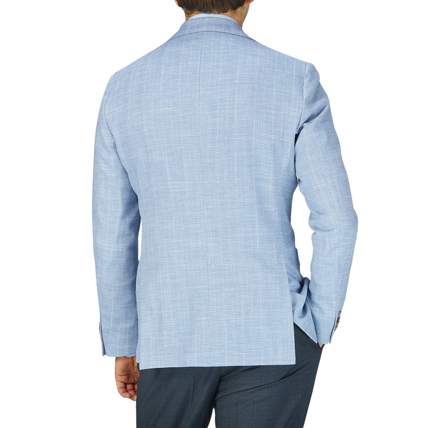 The back view of a man wearing an Eduard Dressler Light Blue Herringbone Cotton Linen Sendrik Blazer.