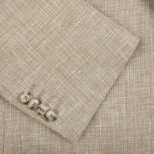 A close up of a Eduard Dressler Light Brown Wool Linen Hopsack Sendrik Blazer with buttons.