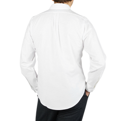 The back view of a man wearing a Far East Manufacturing White Cotton Oxford BD Regular Shirt.