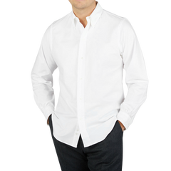 A man wearing a Far East Manufacturing White Cotton Oxford BD Regular Shirt.