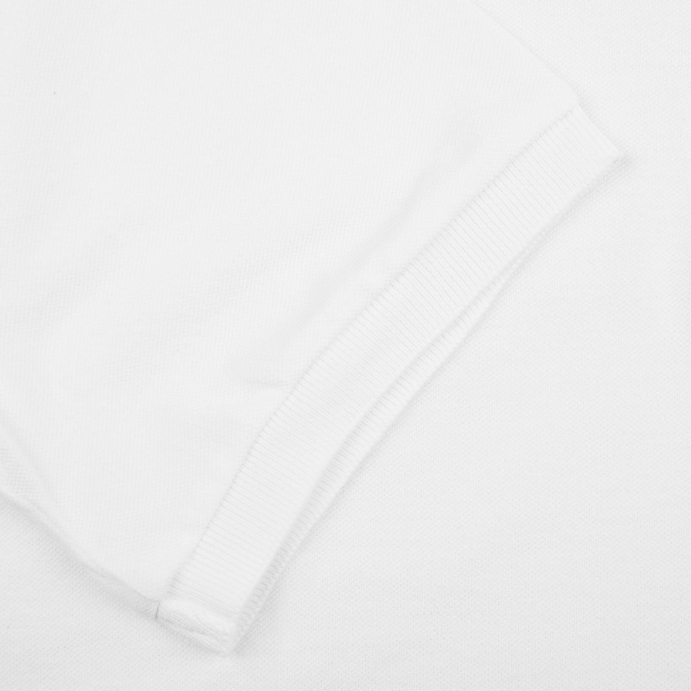 A superior quality Fedeli washed white cotton pique polo shirt.