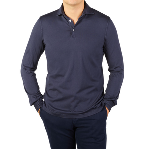A man wearing a Navy Blue Organic Cotton LS polo shirt by Fedeli.