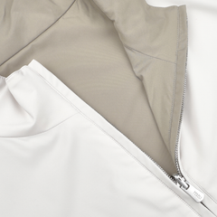 Close-up of an unzipped Beige Nougat Nylon Reversible Blouson Jacket by Fedeli, showing the inner lining and visible metal zipper teeth.