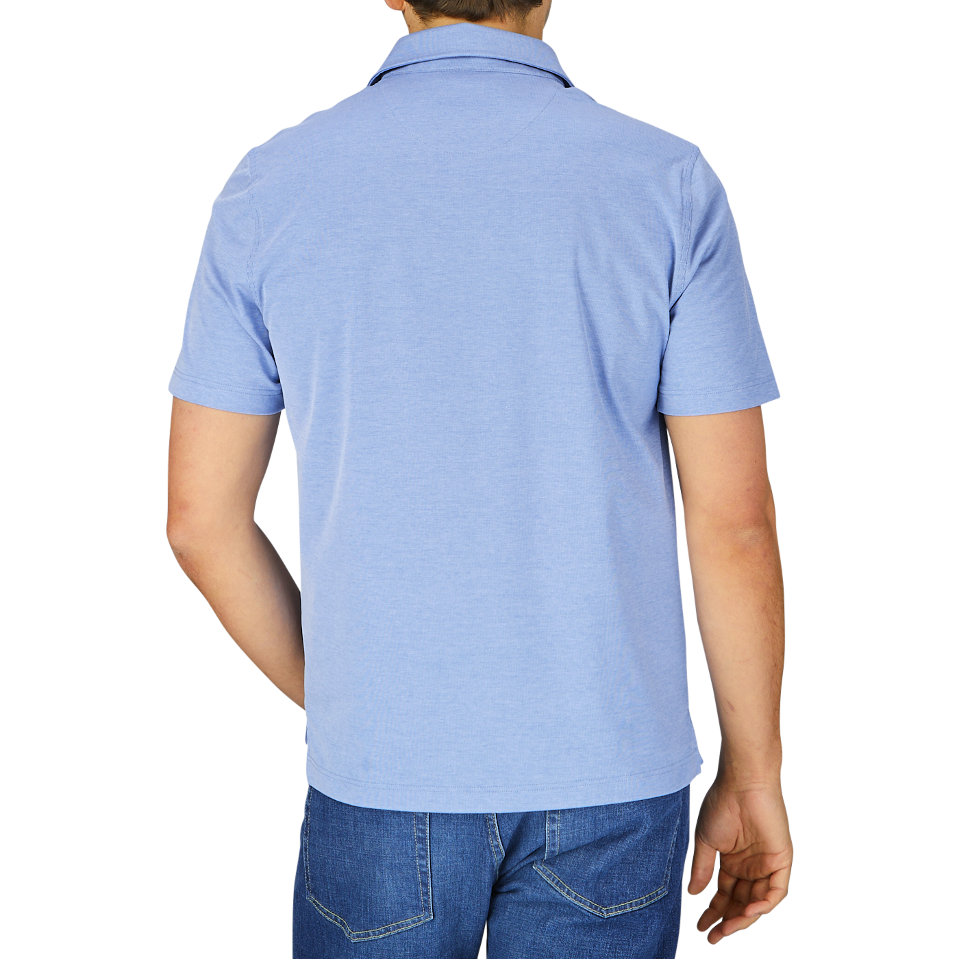 Man wearing a slim fit, blue Fedeli Fil-a-Fil Cotton Jersey Polo Shirt and jeans, viewed from behind.