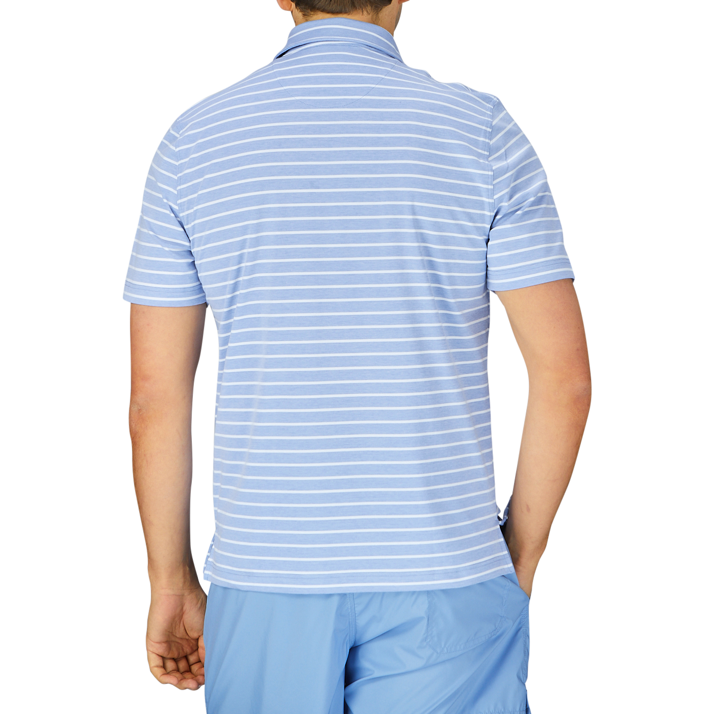 Man wearing a slim fit, blue and white striped contemporary summer Fedeli polo shirt, viewed from the back.