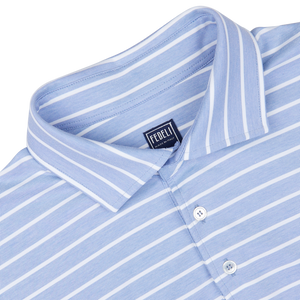 Close-up of a Fedeli Blue Wide Striped Cotton Jersey Polo Shirt with a collar label, made in Italy.