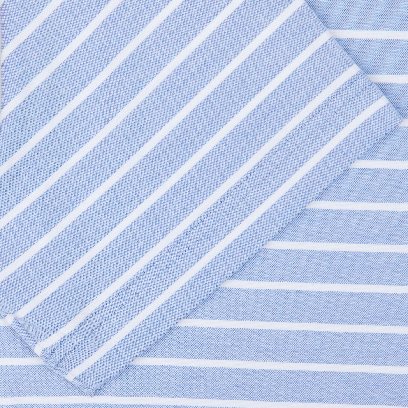 Striped blue fabric with contrasting orientations, crafted into a Fedeli Blue Wide Striped Cotton Jersey Polo Shirt.
