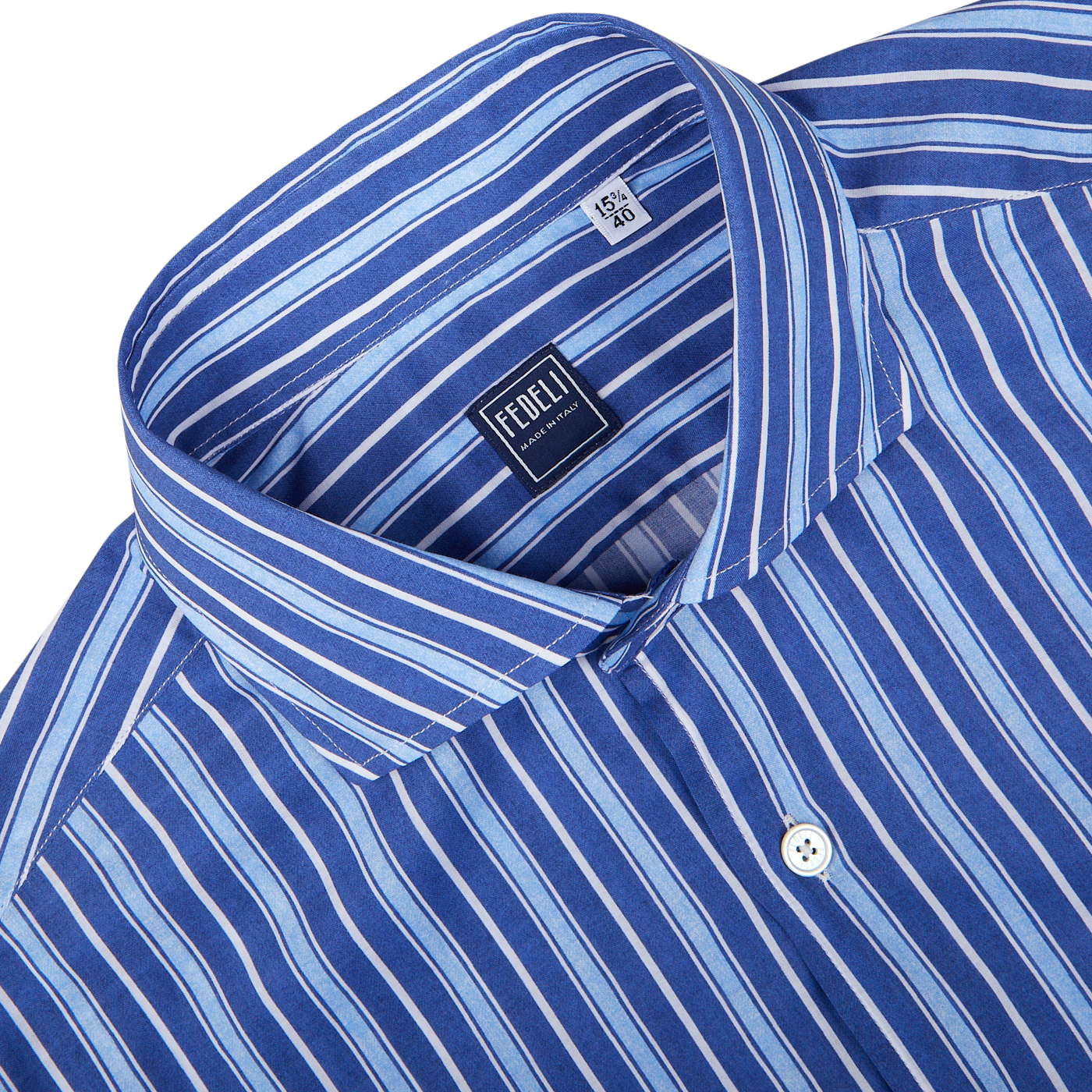 Close-up of a dark blue striped men's slim fit dress shirt with a label showing the brand 'Fedeli'.