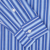Blue and white striped, slim fit Fedeli shirt made from cotton stretch fabric, with a close-up view of the cuff and button.