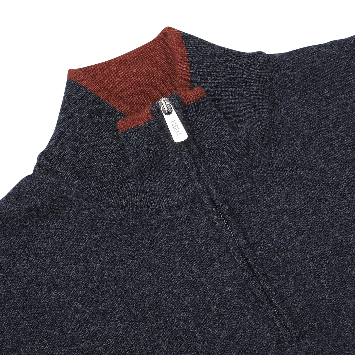 Close-up of the Fedeli Dark Blue Wool Cashmere 1/4 Zip Sweater, crafted from a luxurious wool-cashmere blend. This sophisticated piece features a silver zipper pull and a contrasting red collar detail. It's perfect as a layering piece for added warmth and style.