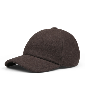 The Fedeli Dark Brown Felted Cashmere Cap features a curved brim and a button on top, crafted from textured felted cashmere.