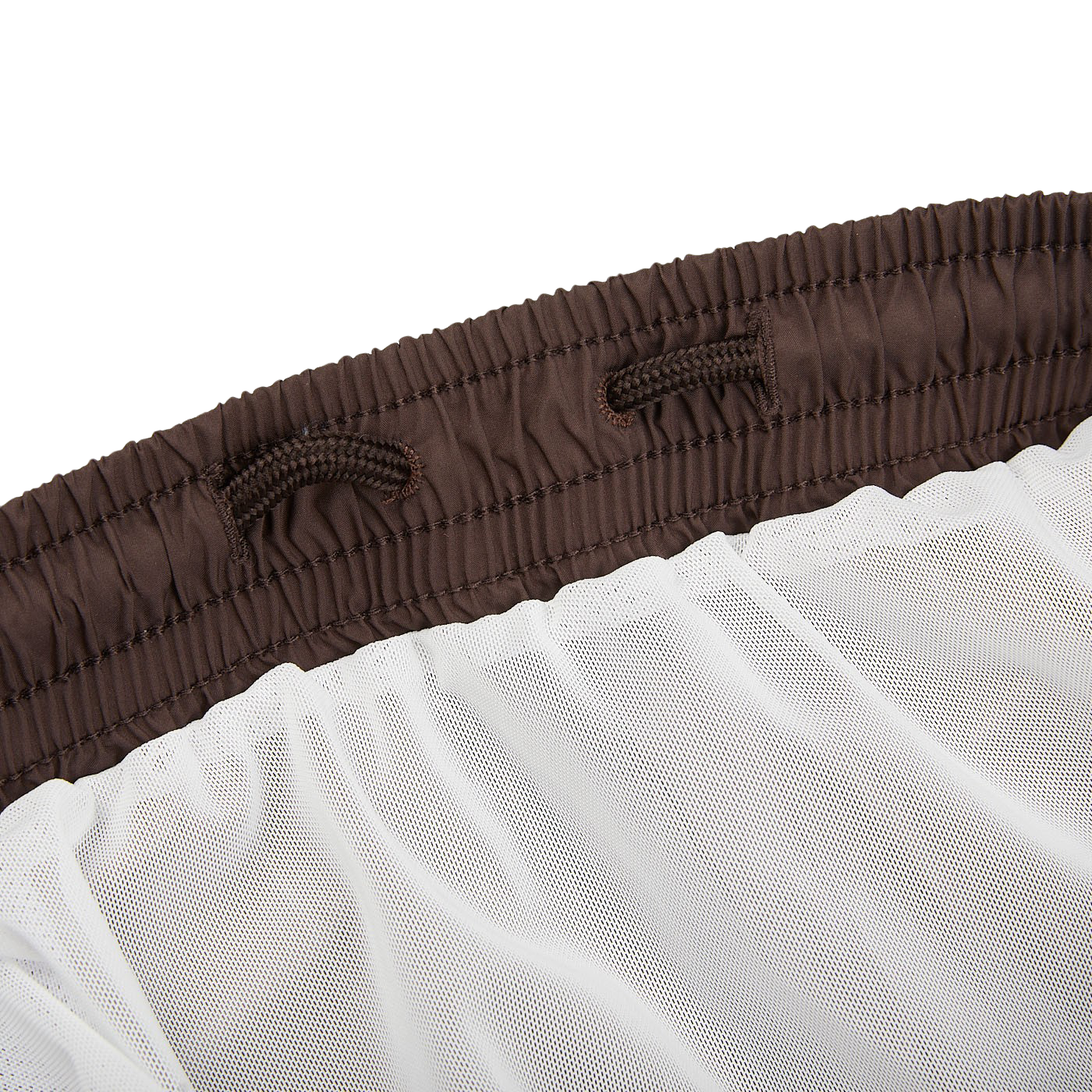 A close up of a Fedeli Dark Brown Microfiber Madeira Swim Shorts curtain.