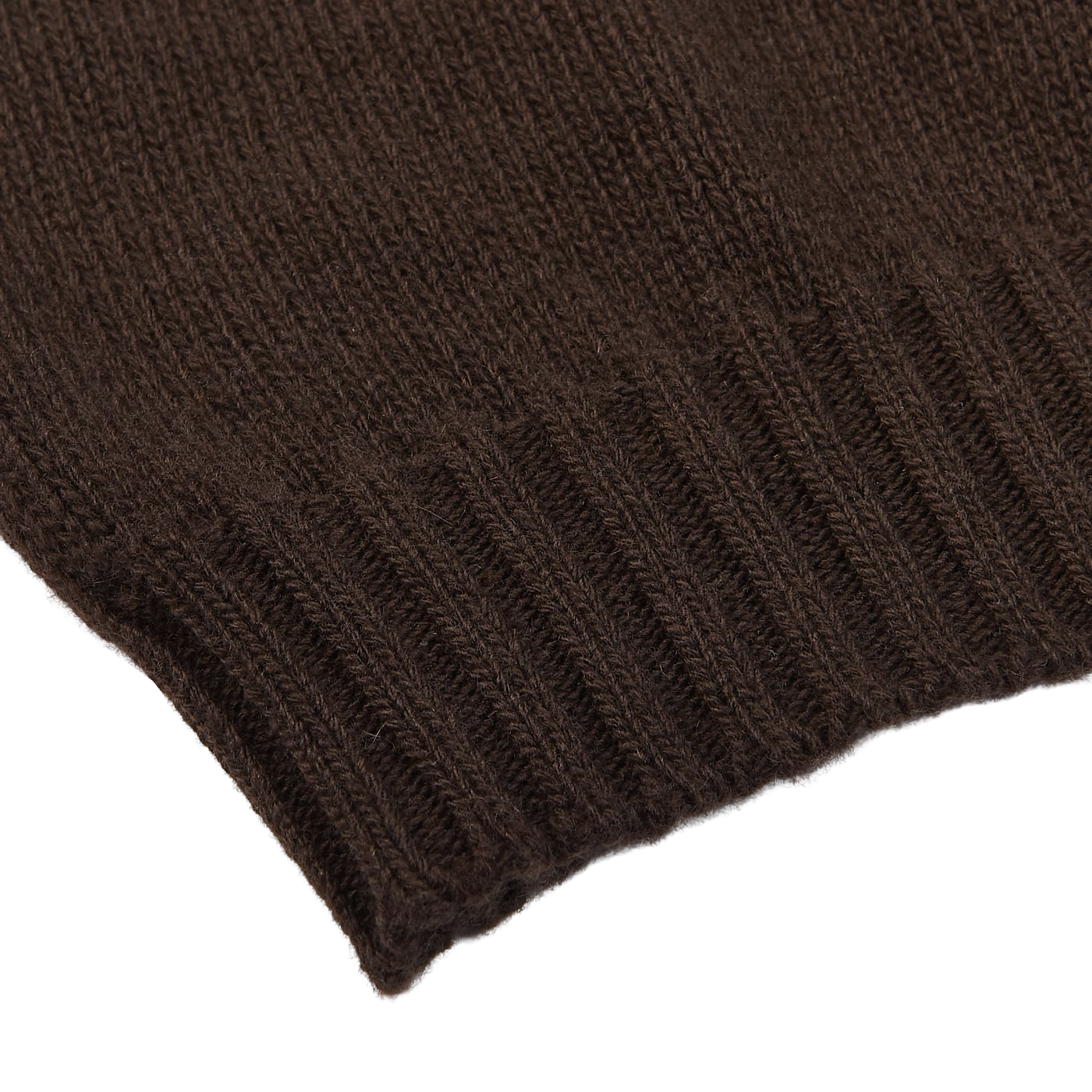 Close-up of the Dark Brown Wool Cashmere Rollneck by Fedeli, showcasing its ribbed edging against a white backdrop.