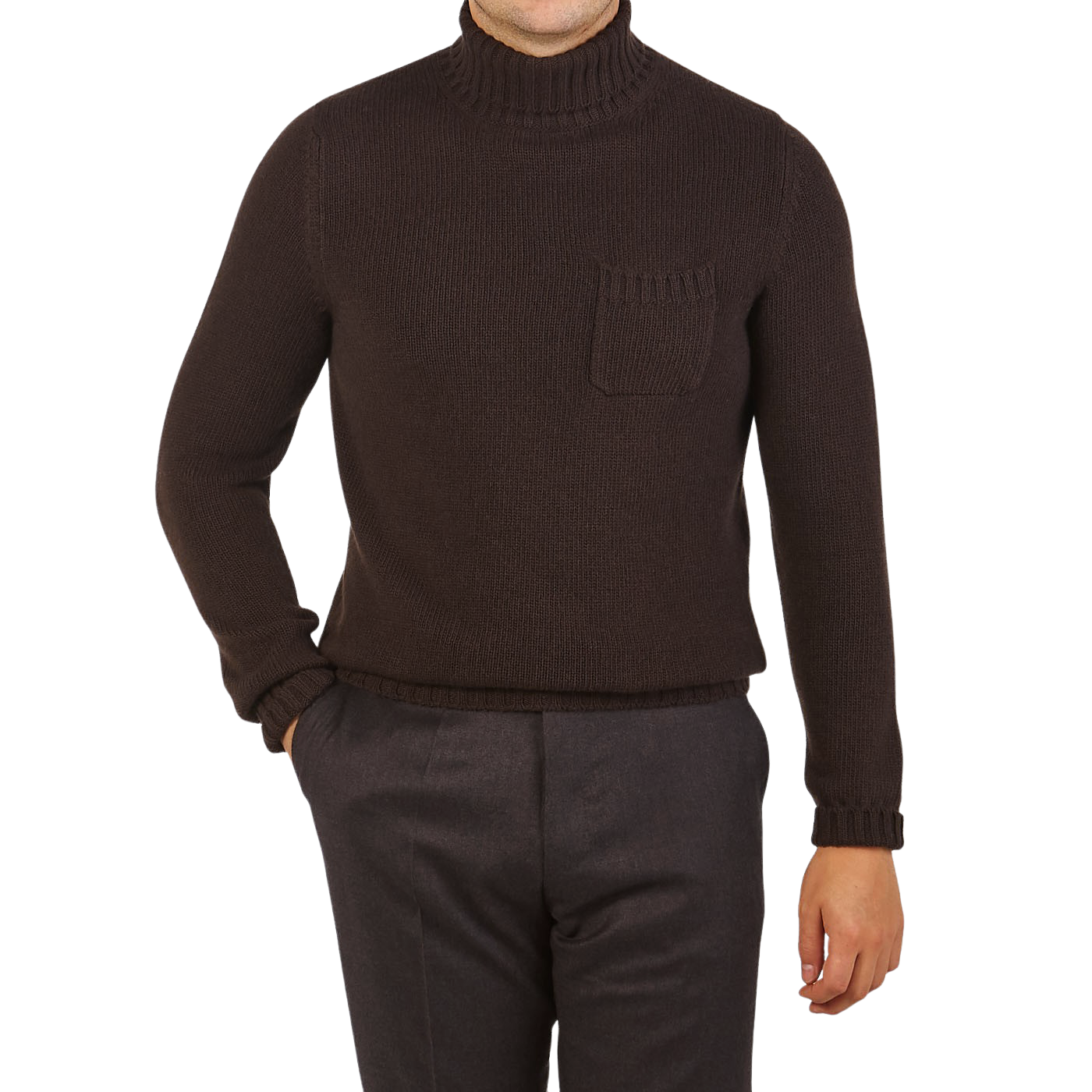 A person in a Fedeli Dark Brown Wool Cashmere Rollneck stands with one hand in their pocket wearing dark pants against a plain background.