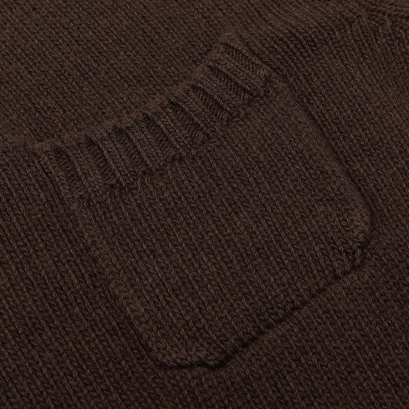 Close-up of the Dark Brown Wool Cashmere Rollneck by Fedeli, showcasing a brown knitted design with a roll neck and ribbed edges on the front pocket.