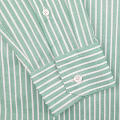 Close-up of the Green White Striped Cotton Beach Shirt by Fedeli, made from cotton stretch fabric, featuring a green and white vertical stripe design and buttoned sleeve cuffs.