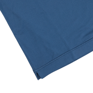 A luxury Indigo Blue Organic Cotton T-shirt by Fedeli on a white surface.